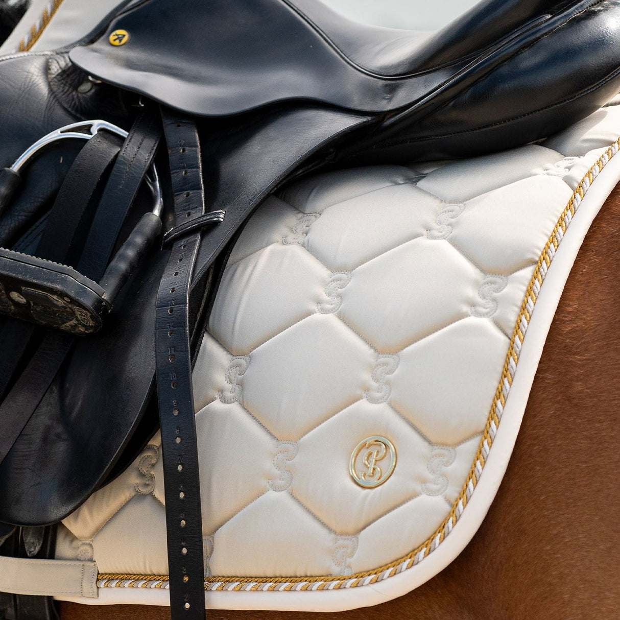 PS of Sweden Jump Signature Saddle Pad #colour_dark-ivory